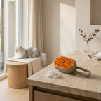 Cat being brushed with steam grooming brush